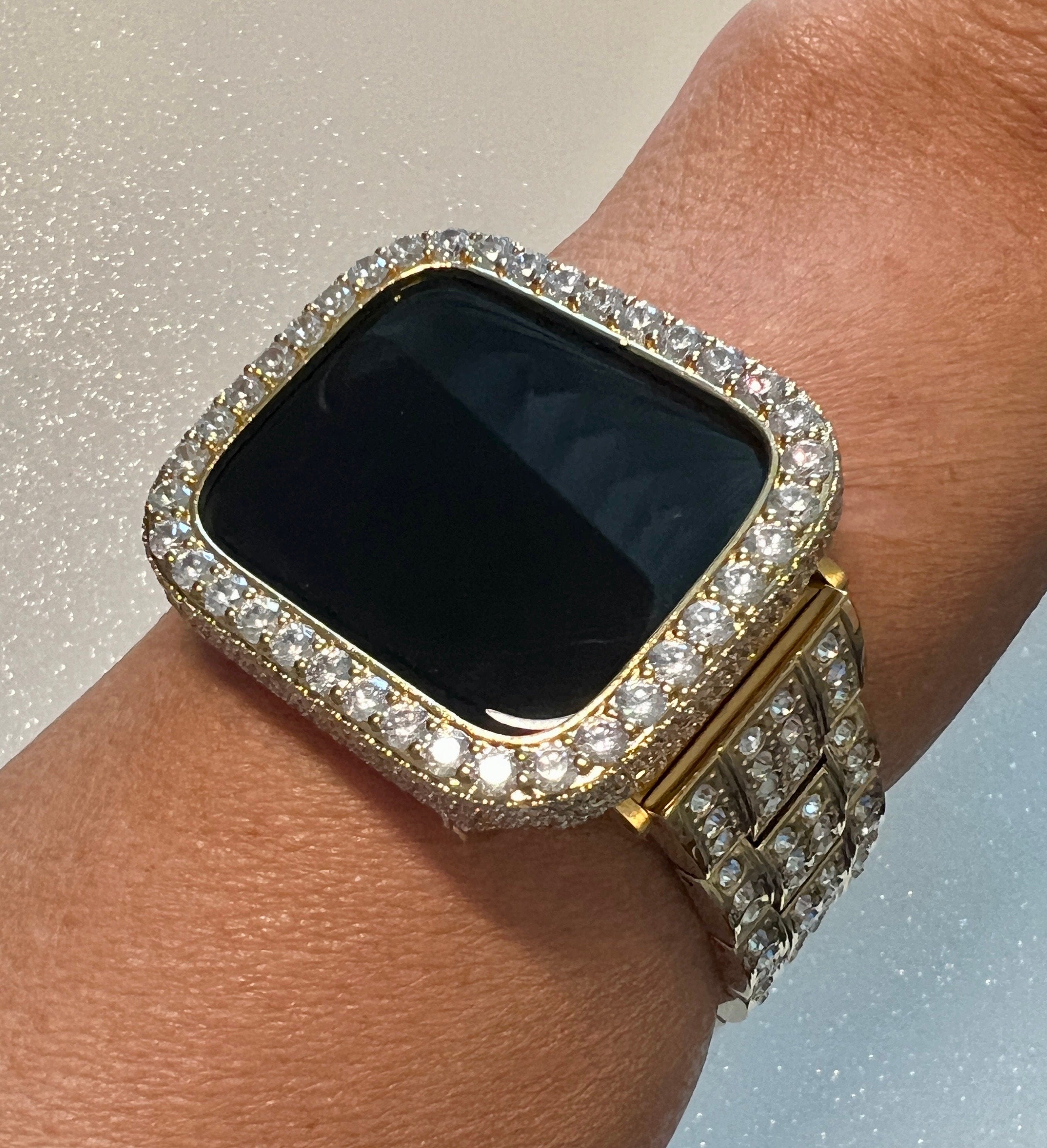 Designer Mens Apple Watch Band Womens Yellow Gold studded with large Swarovski Crystals in Stainless Steel and or Apple Watch Bezel Cover with large 3.5mm Lab Diamonds set in 14k gold plating.  From Iwatch Candy in sizes 38mm-45mm