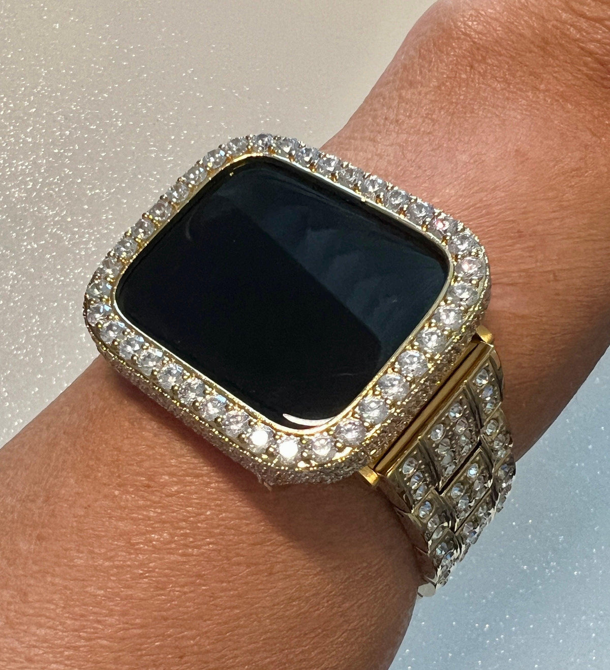 Designer Mens Apple Watch Band Womens Yellow Gold studded with large Swarovski Crystals in Stainless Steel and or Apple Watch Bezel Cover with large 3.5mm Lab Diamonds set in 14k gold plating.  From Iwatch Candy in sizes 38mm-45mm