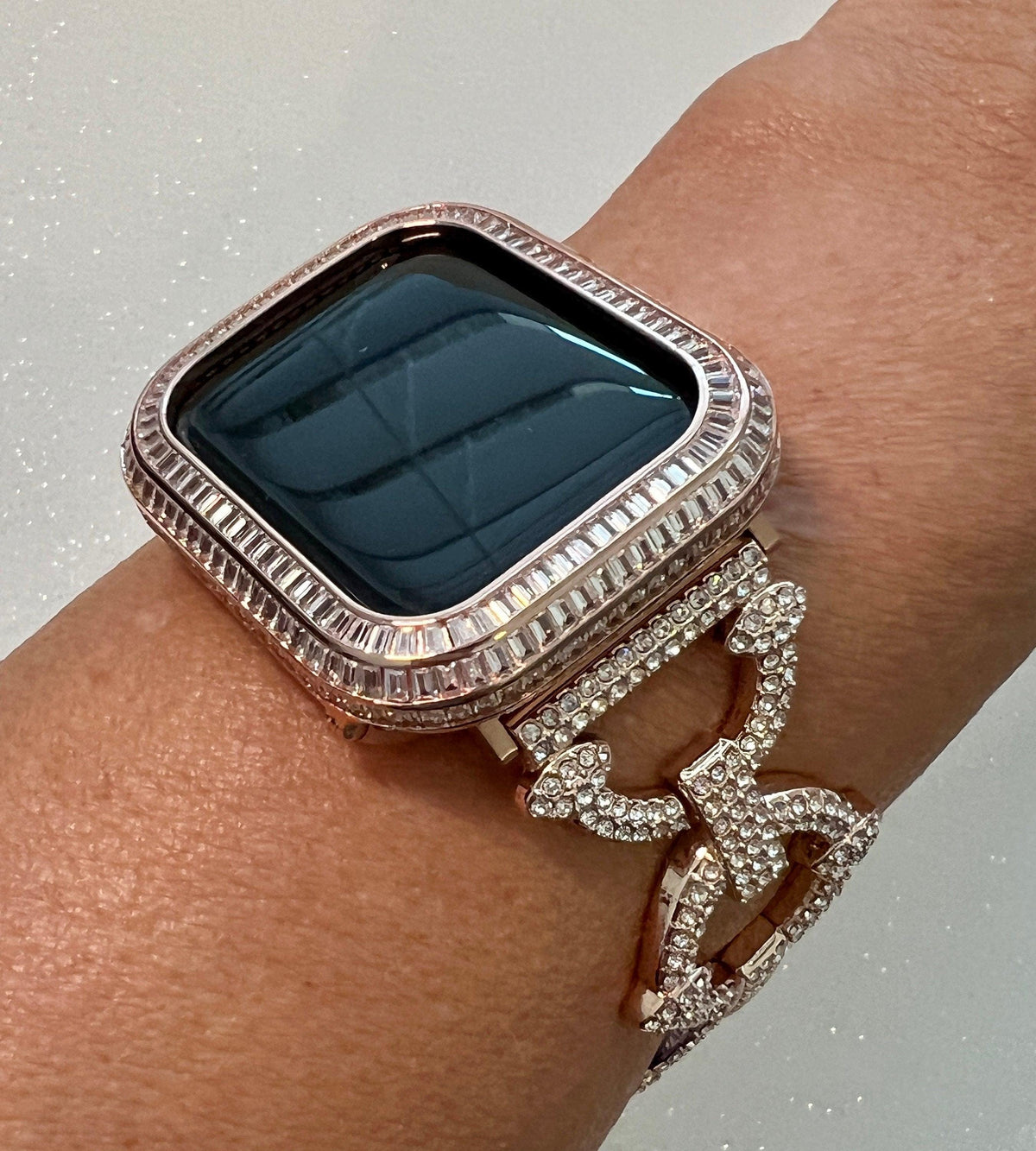 Luxury Apple Watch Band Womens style with pave Swarovski Crystals in Rose Gold and or Designer Apple Watch Cover with 3 rows of Baguette Lab Diamonds.  Sizes 38mm-45mm from Iwatch Candy